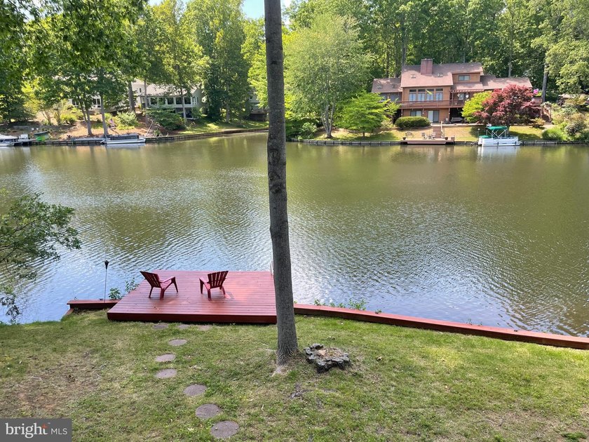 **Price Improvement!** Panoramic water views surround this - photo 17
