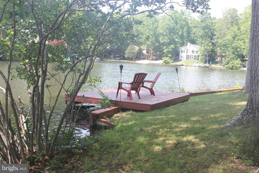**Price Improvement!** Panoramic water views surround this - photo 47