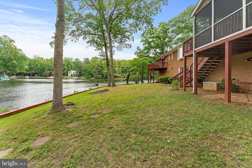 **Price Improvement!** Panoramic water views surround this - photo 49
