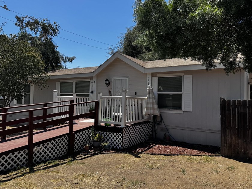 This is a 3 bedroom 2 full bath manufactured home on land - photo 2
