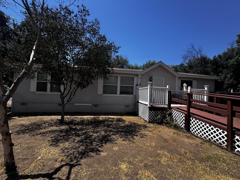 This is a 3 bedroom 2 full bath manufactured home on land - photo 3