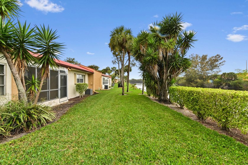 Step inside this beautiful 2-bedroom, 2-bathroom end-unit villa - photo 23