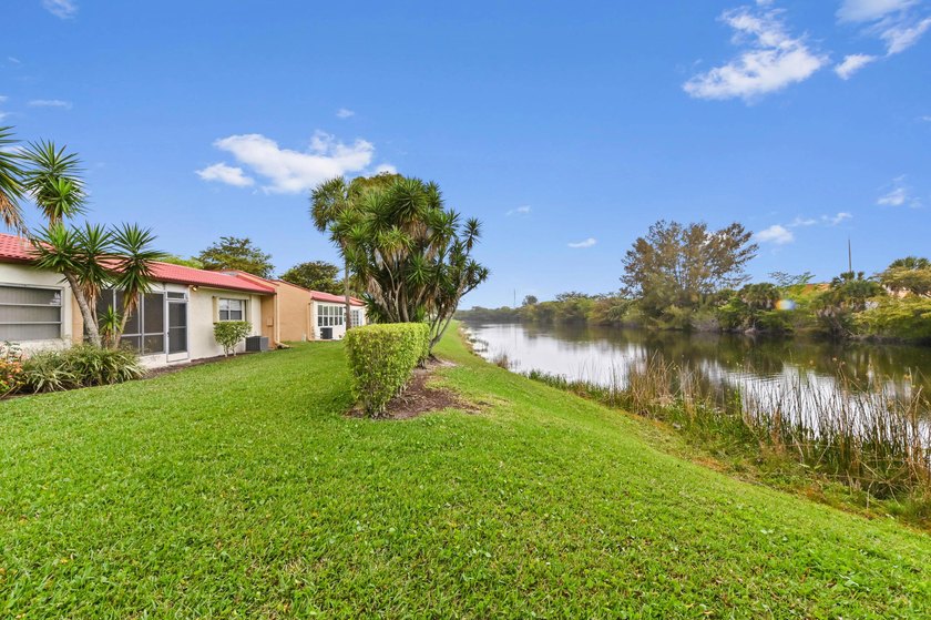 Step inside this beautiful 2-bedroom, 2-bathroom end-unit villa - photo 24
