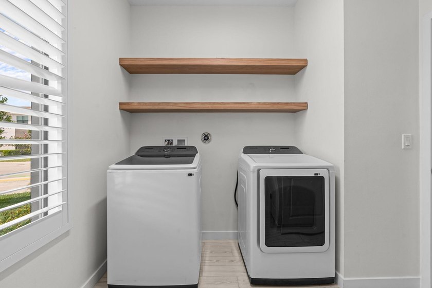 Beautifully upgraded and filled with natural light, this - photo 16