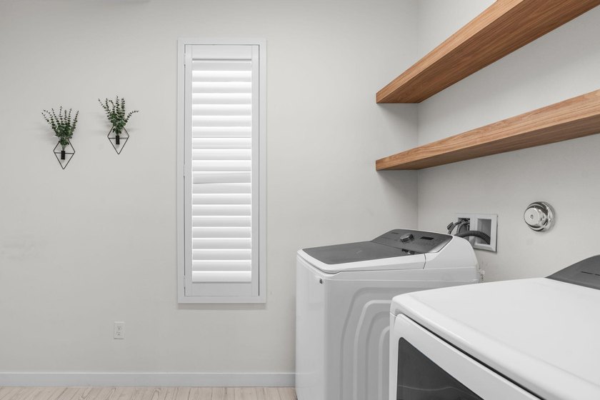 Beautifully upgraded and filled with natural light, this - photo 17