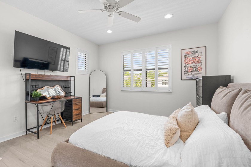 Beautifully upgraded and filled with natural light, this - photo 19