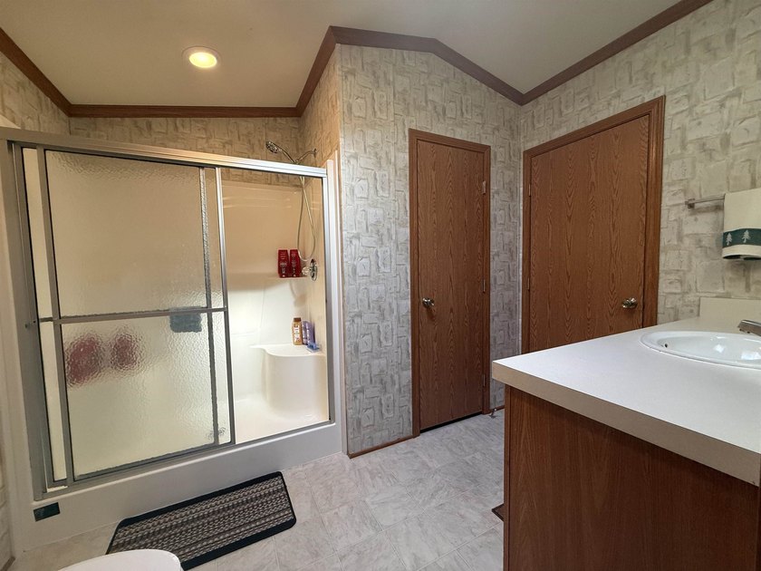 Welcome to this charming 3-bedroom, 2-bath home located in the - photo 12