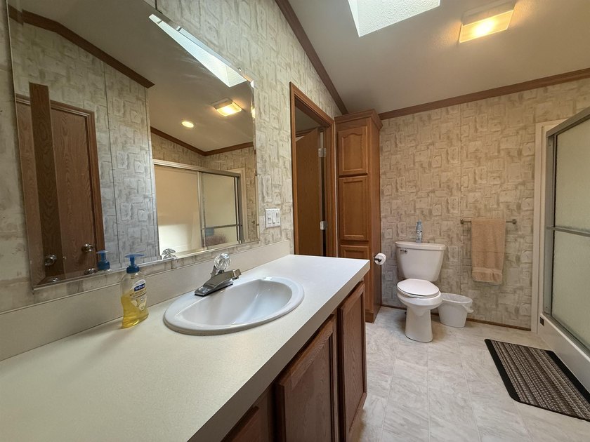 Welcome to this charming 3-bedroom, 2-bath home located in the - photo 13