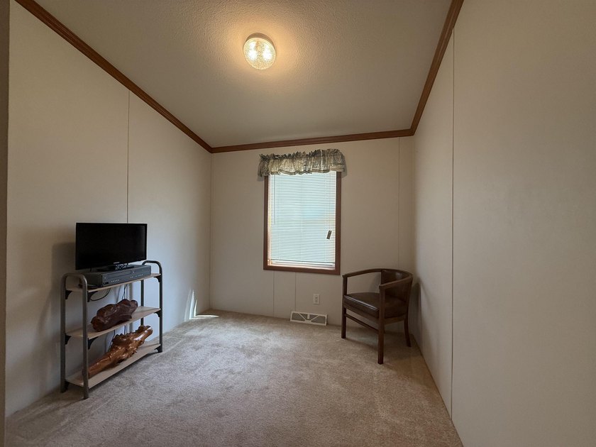 Welcome to this charming 3-bedroom, 2-bath home located in the - photo 18