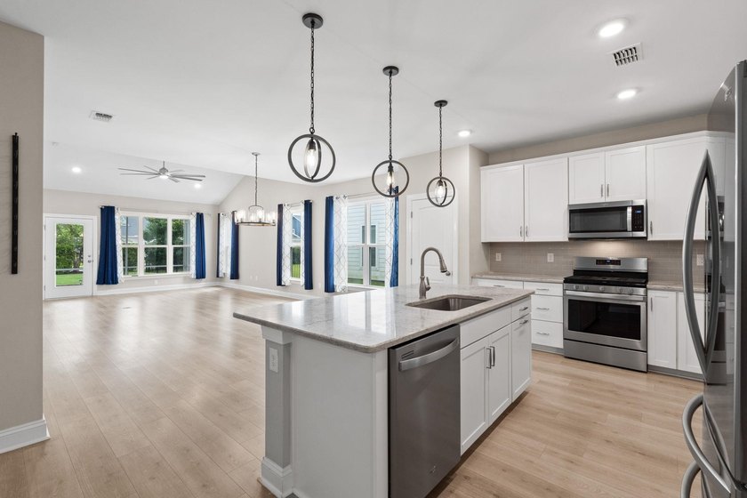 Better than new, this 3-bedroom, 2-bath home with a flexible - photo 21