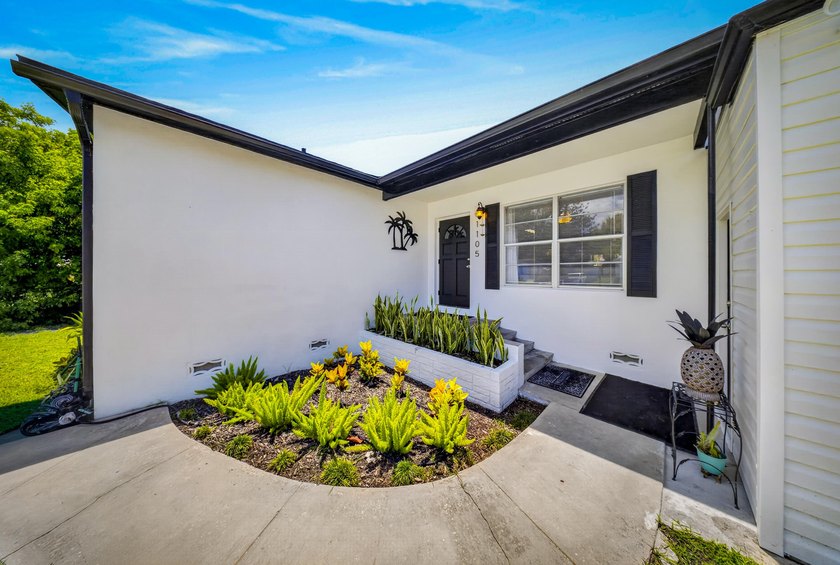 This beautifully updated home offers many recent improvements - photo 2