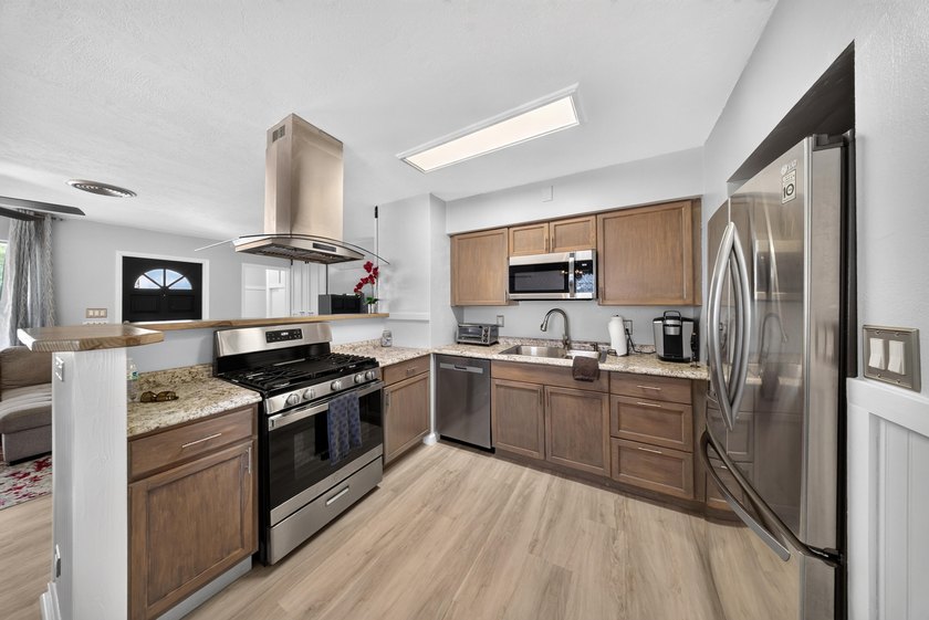 This beautifully updated home offers many recent improvements - photo 3