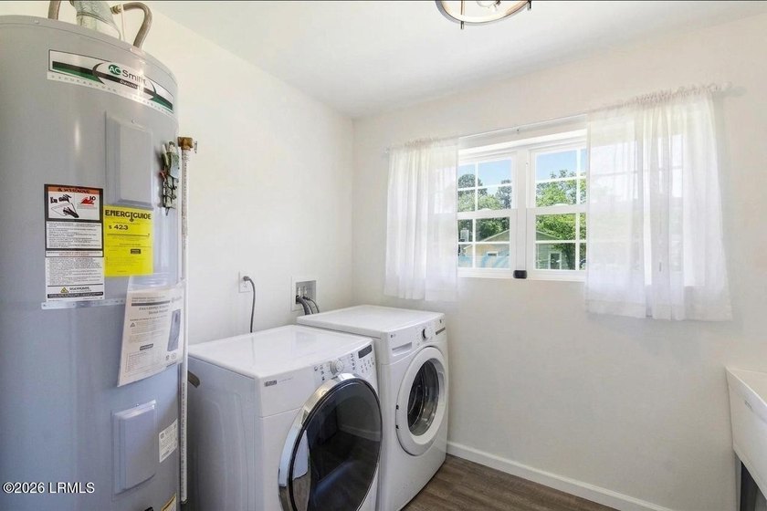 Nestled on a spacious corner lot in a private cul-de-sac, this - photo 24