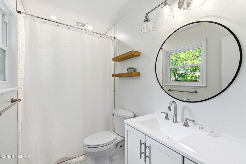 Nestled on a spacious corner lot in a private cul-de-sac, this - photo 32