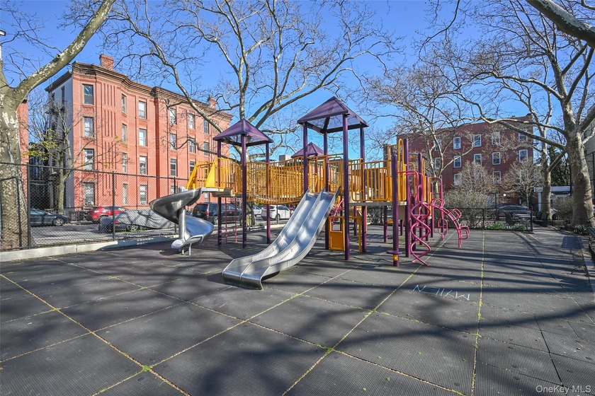 This classic four-story brownstone with beautiful architectural - photo 12