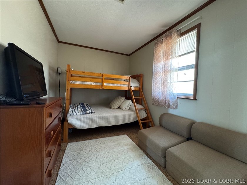 This lake access cabin is perfect for the serious fisherman or - photo 27