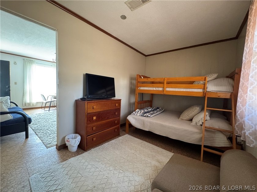 This lake access cabin is perfect for the serious fisherman or - photo 29