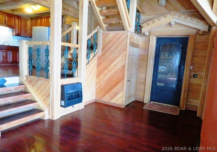 A VIEW FOR MILES! This one-of-a-kind custom log home showcases - photo 11