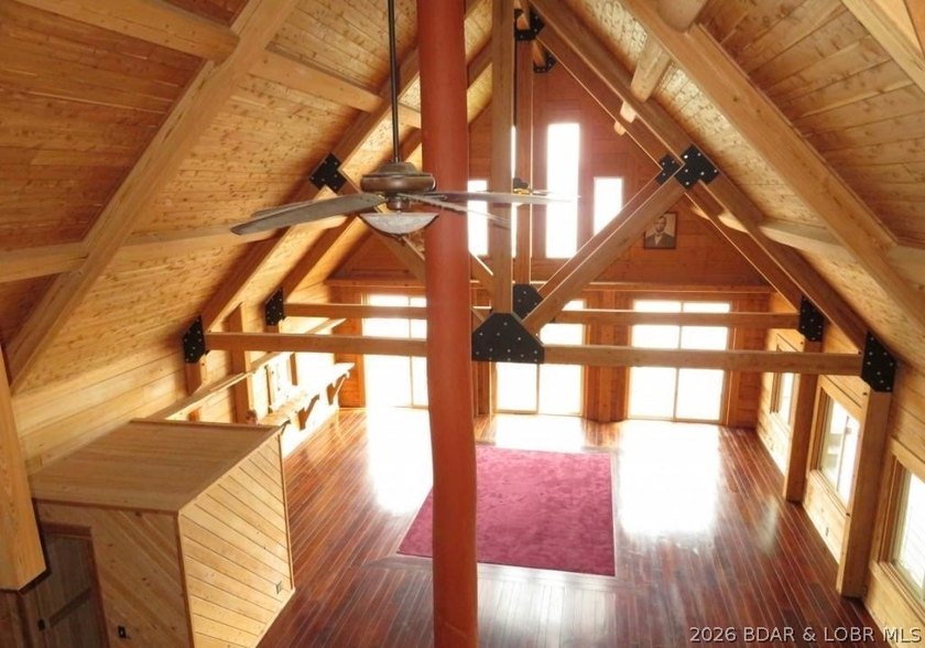 A VIEW FOR MILES! This one-of-a-kind custom log home showcases - photo 18