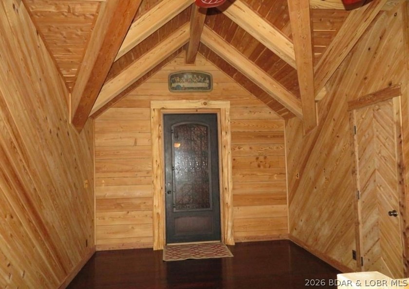 A VIEW FOR MILES! This one-of-a-kind custom log home showcases - photo 19