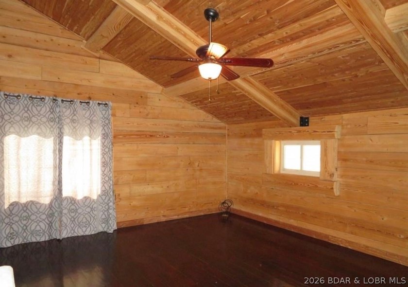 A VIEW FOR MILES! This one-of-a-kind custom log home showcases - photo 20