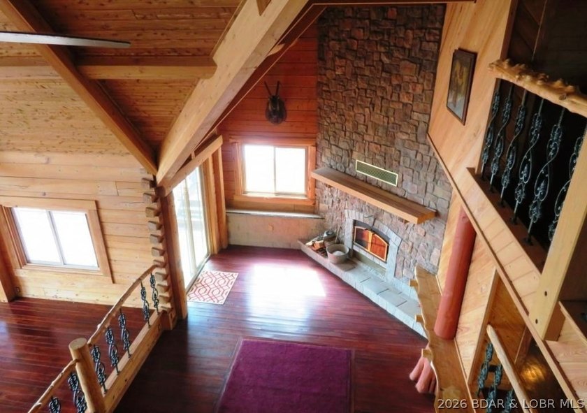 A VIEW FOR MILES! This one-of-a-kind custom log home showcases - photo 22