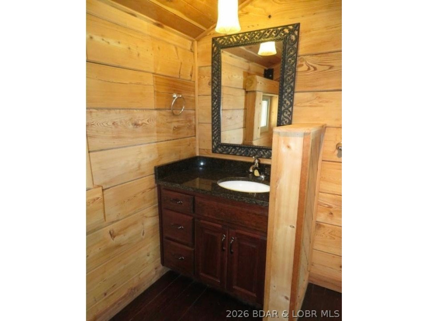 A VIEW FOR MILES! This one-of-a-kind custom log home showcases - photo 26