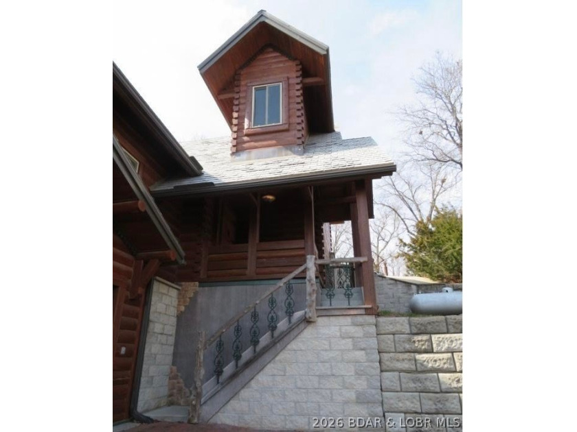A VIEW FOR MILES! This one-of-a-kind custom log home showcases - photo 31