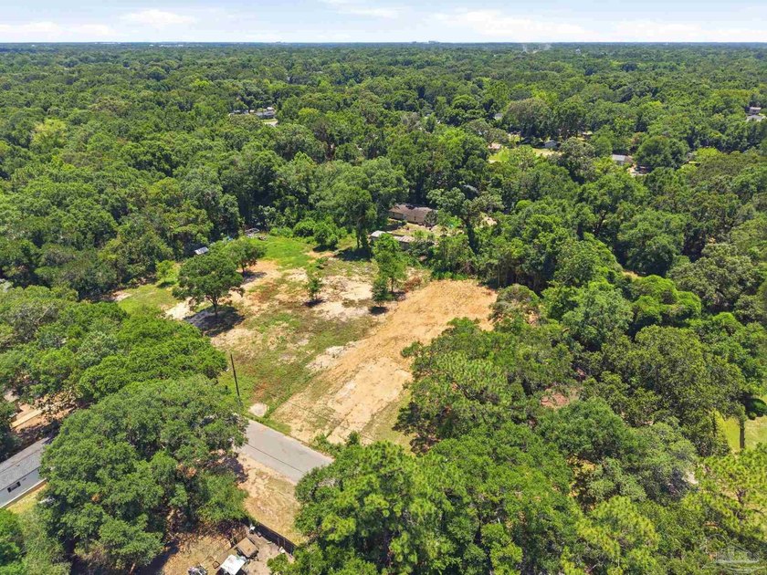 Cleared and ready to build, this nearly 1-acre lot offers - photo 14