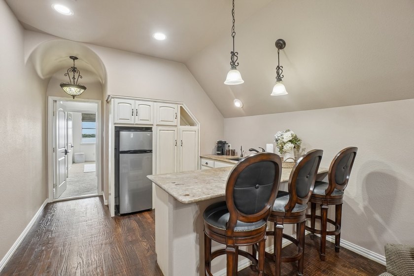 Lake living without the maintenance! Enjoy stunning views at - photo 27