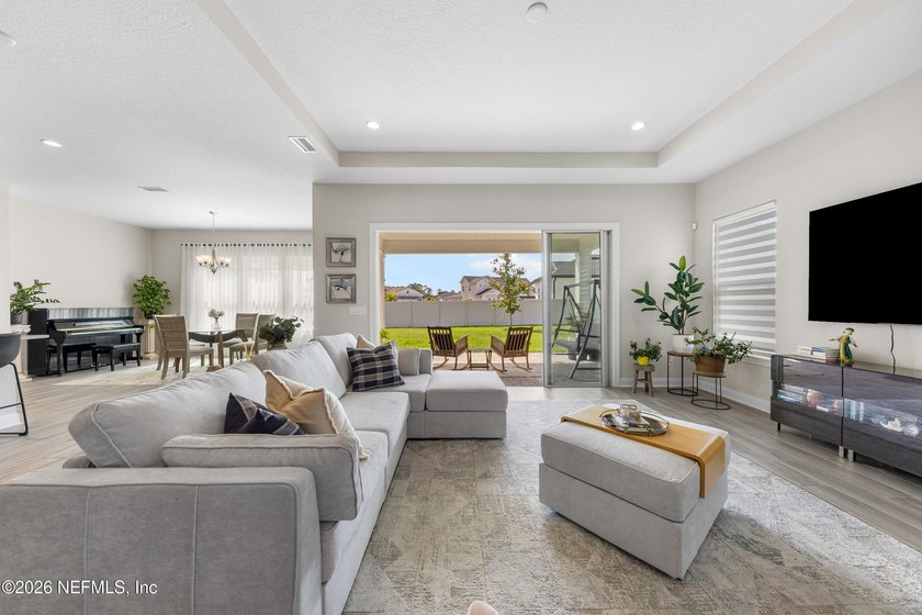 THIS HOME FEELS BRAND NEW! Located on a rare .38-acre fully - photo 3