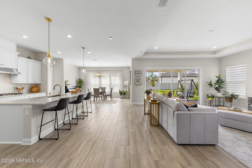 THIS HOME FEELS BRAND NEW! Located on a rare .38-acre fully - photo 5