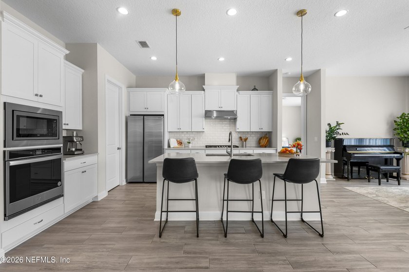 THIS HOME FEELS BRAND NEW! Located on a rare .38-acre fully - photo 7