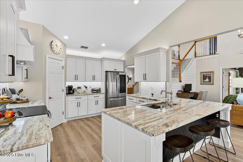 Enjoy the ease of low-maintenance coastal living in one of - photo 7