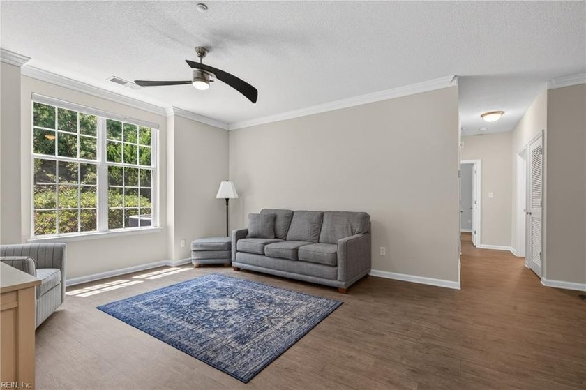 Enjoy easy one-level living in the sought-after Promenade at - photo 5