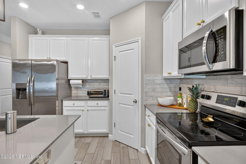 Welcome home to this beautifully maintained townhome in the - photo 11