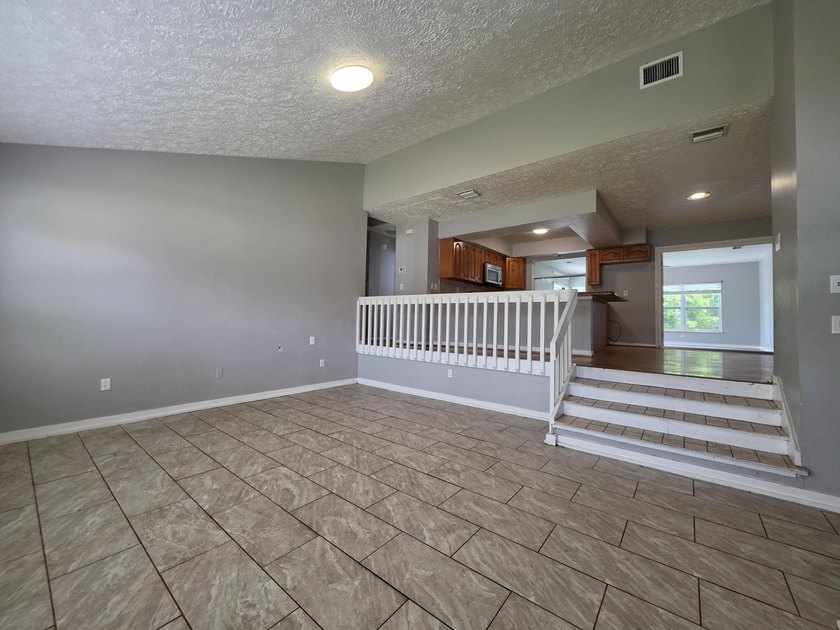 Discover this 3-bedroom, 2-bathroom home features an attached - photo 4