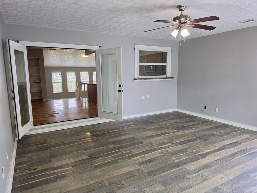 Discover this 3-bedroom, 2-bathroom home features an attached - photo 9