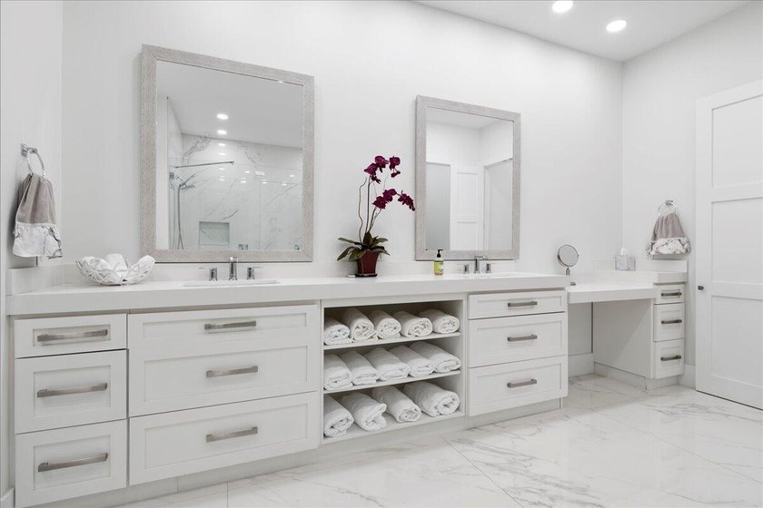 Come see this meticulously renovated residence is located in the - photo 20