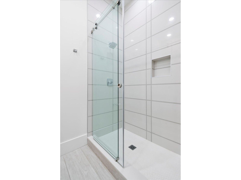 Come see this meticulously renovated residence is located in the - photo 34