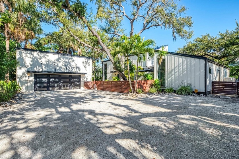 Now is your opportunity to own this waterfront tropical oasis on - photo 3