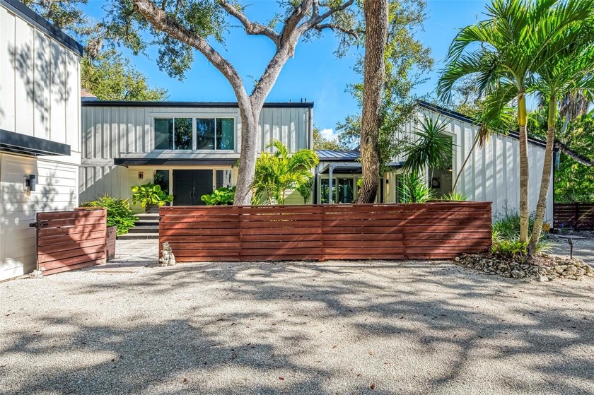 Now is your opportunity to own this waterfront tropical oasis on - photo 4