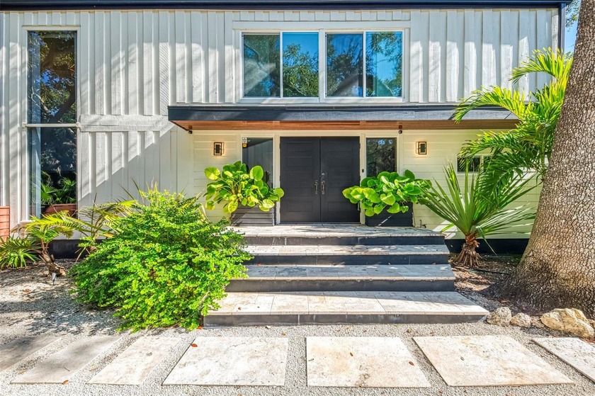 Now is your opportunity to own this waterfront tropical oasis on - photo 5