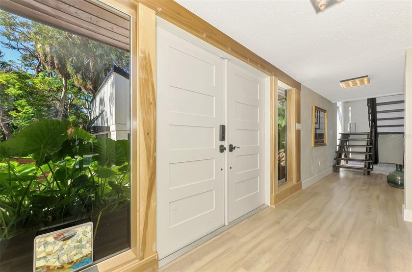 Now is your opportunity to own this waterfront tropical oasis on - photo 9