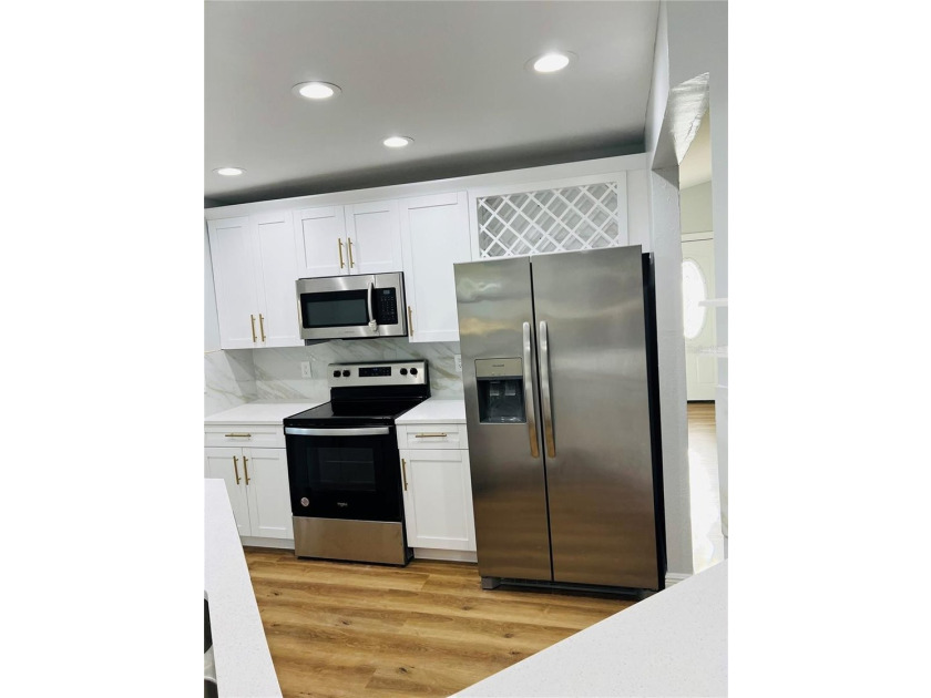 Fully remodeled, this stunning 3-bedroom, 2-bath single-family - photo 12