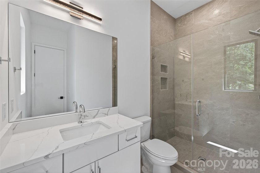Experience refined lakefront living in this stunning new - photo 20