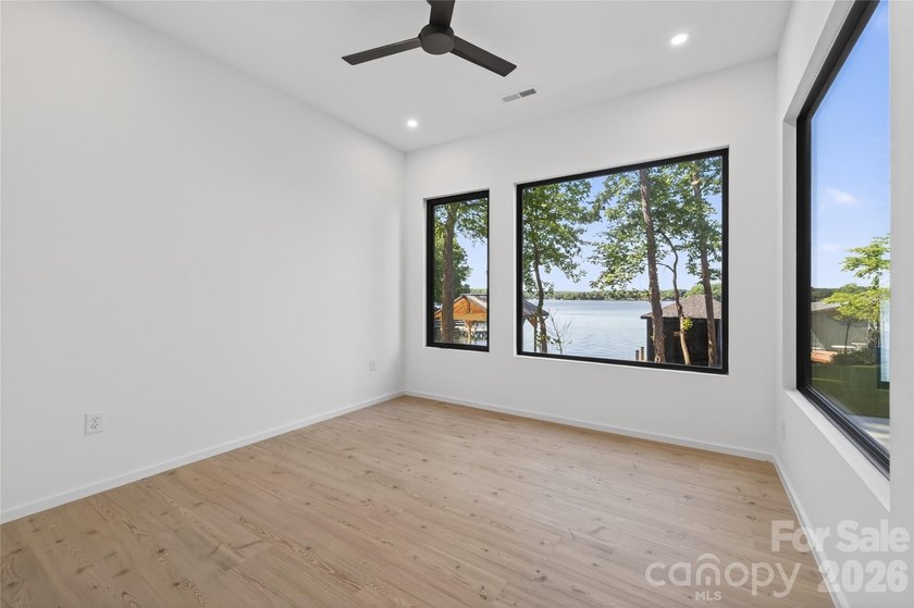 Experience refined lakefront living in this stunning new - photo 21