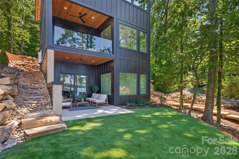 Experience refined lakefront living in this stunning new - photo 26