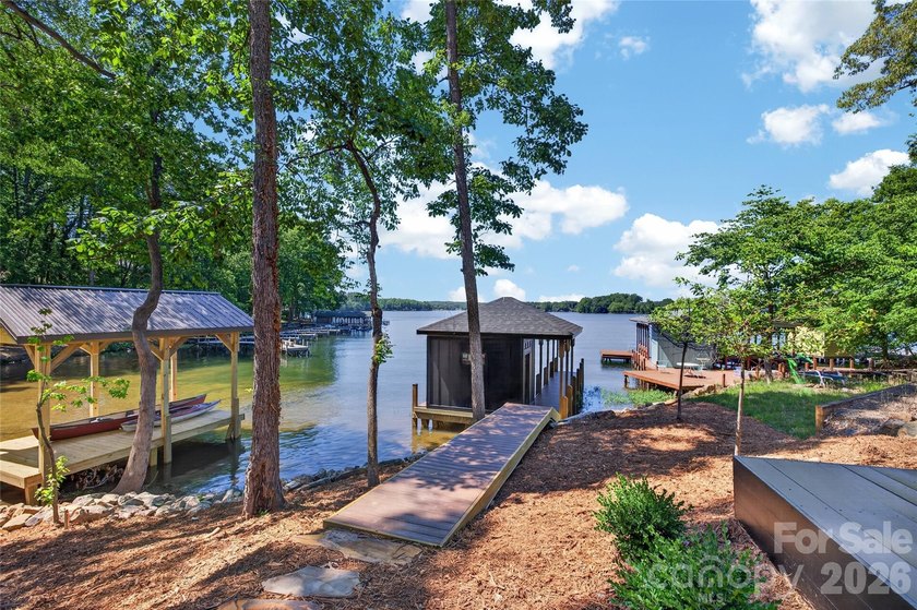Experience refined lakefront living in this stunning new - photo 27