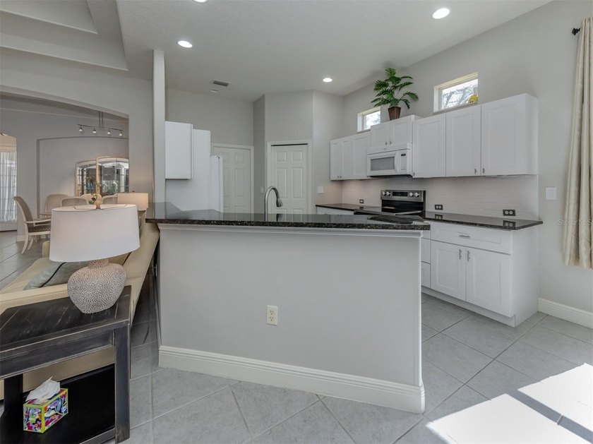 Desirable, turnkey furnished, this light-filled David Hunihan - photo 10